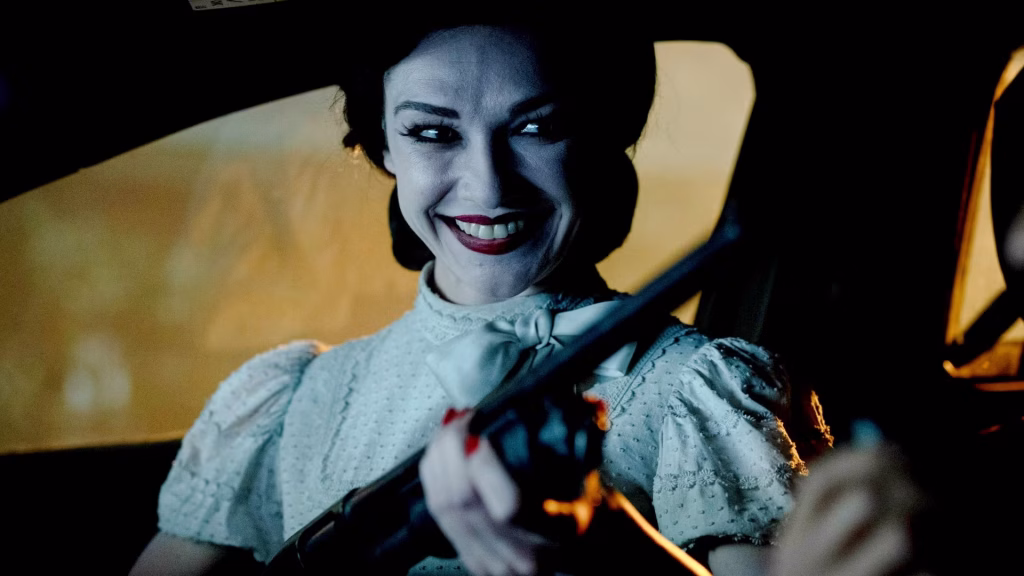 A-ghostly-woman-holding-a-shotgun-in-insidious-out-of-the-further | the Cinema Group ©sony Pictures