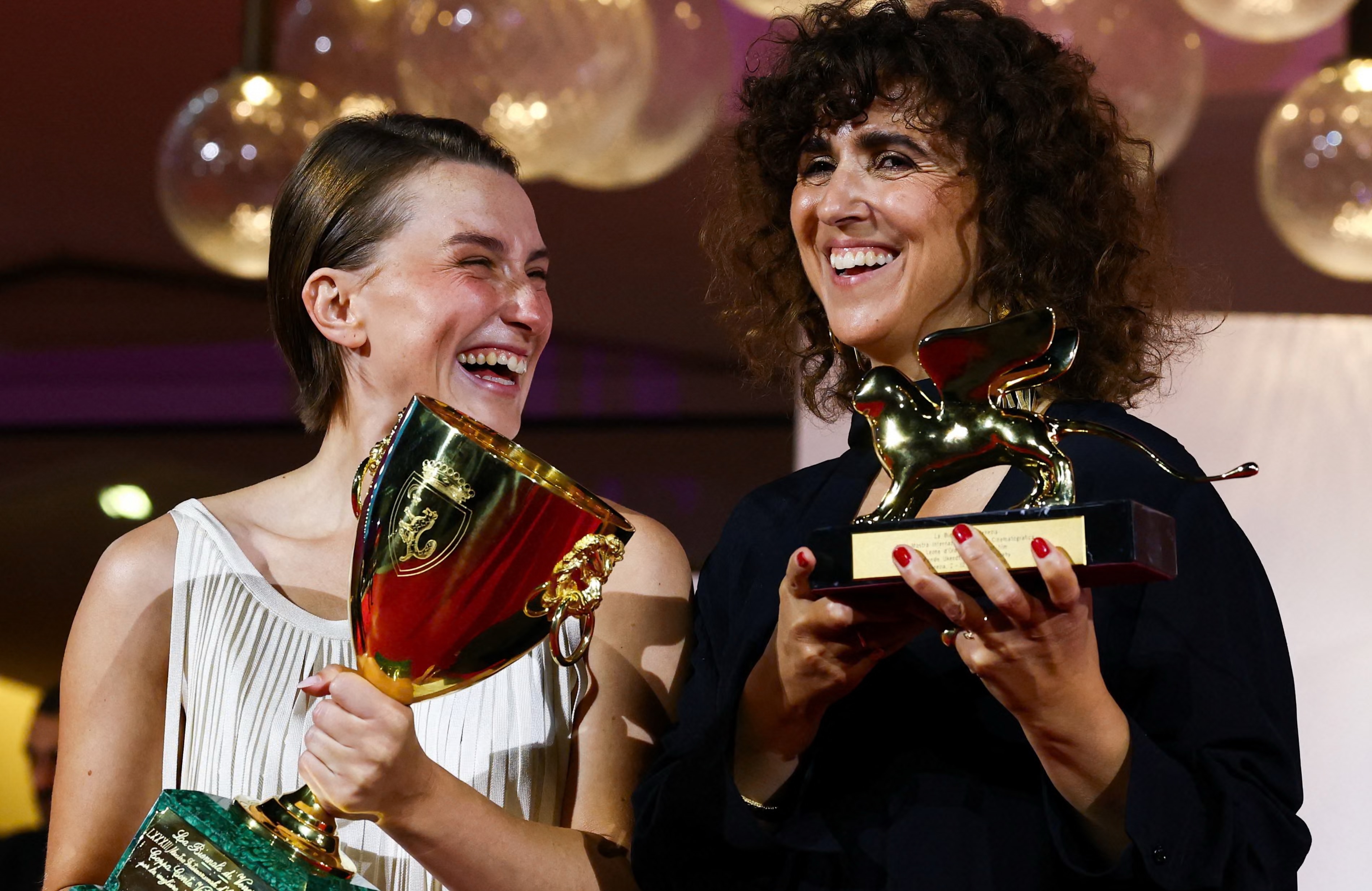 3616 | the Cinema Group Mathilde Arcel Holds the Volpi Cup for Best Actress Beside Her Woman Unknown Director, May El-toukhy, Who Won the Golden Lion for Best Film.